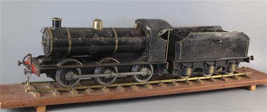 A live steam 2.5 inch 0-6-0 tender locomotive, black livery, overall 75cm